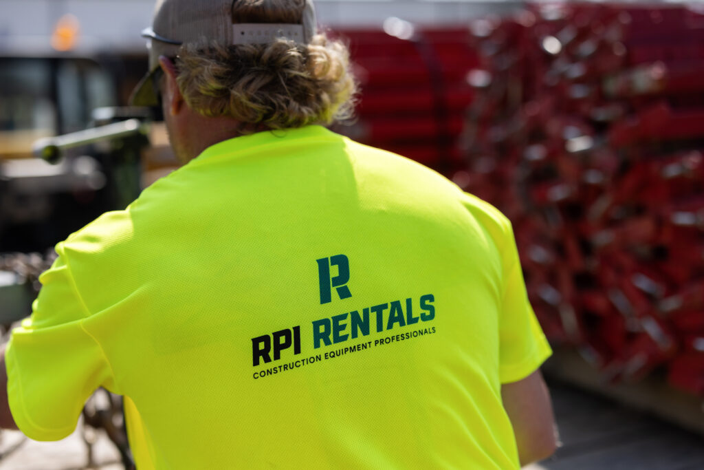 Construction worker wearing an RPI high vis shirt